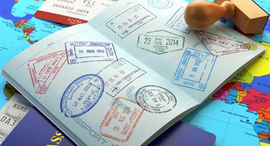 A person holding a passport and flight ticket, representing travel assistance.